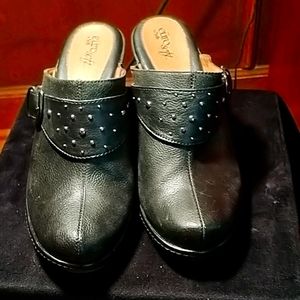 Black clogs..with silver buckle 10M
